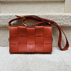 Bottega Veneta grained maxi intrecciato Cassette Bag in burnt orange
